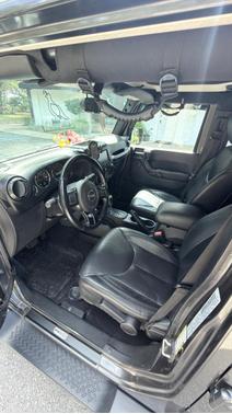Gray 2017 Jeep Wrangler Unlimited Sahara