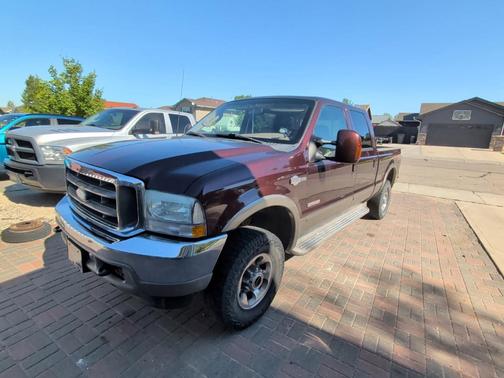 Red 2003 Ford F-250 Lariat Crew Cab Super Duty