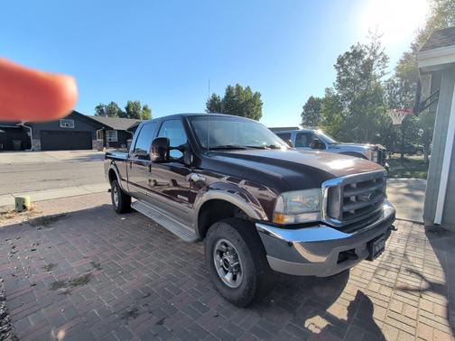 Red 2003 Ford F-250 Lariat Crew Cab Super Duty