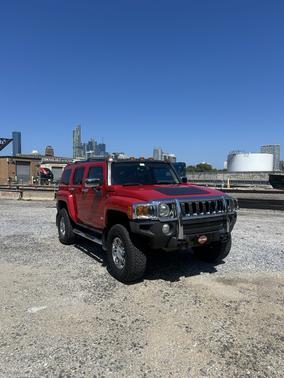 Red 2007 Hummer H3 Base