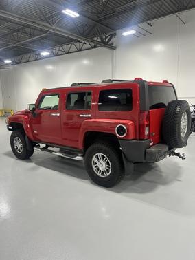 Red 2007 Hummer H3 Base
