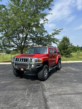 Red 2007 Hummer H3 Base
