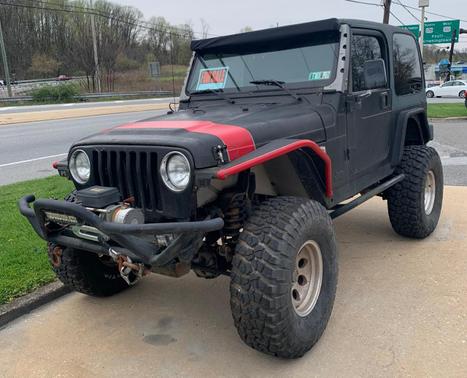 Black 1997 Jeep Wrangler Sport