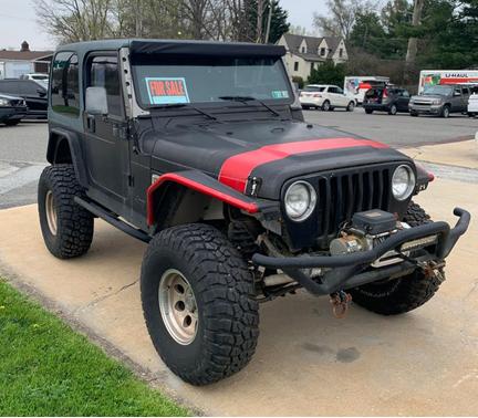 Black 1997 Jeep Wrangler Sport