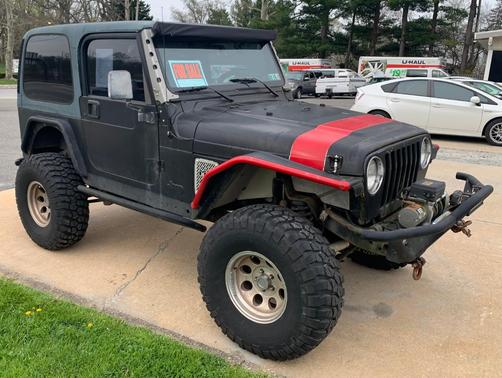 Black 1997 Jeep Wrangler Sport
