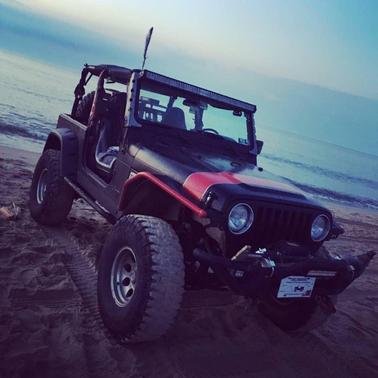 Black 1997 Jeep Wrangler Sport