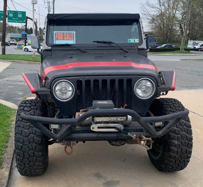 Black 1997 Jeep Wrangler Sport