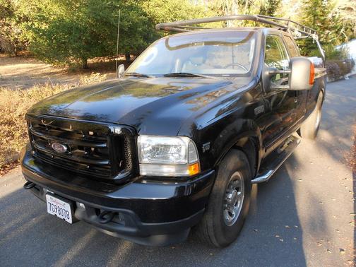 Black 2003 Ford F-250 XLT SuperCab Super Duty