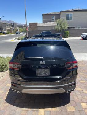 Black 2025 Honda Pilot Touring AWD