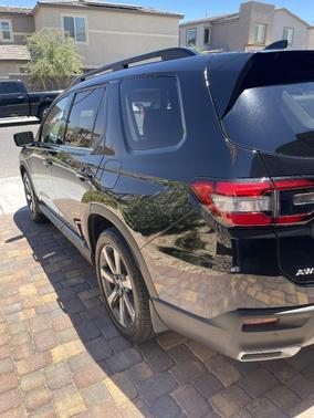 Black 2025 Honda Pilot Touring AWD