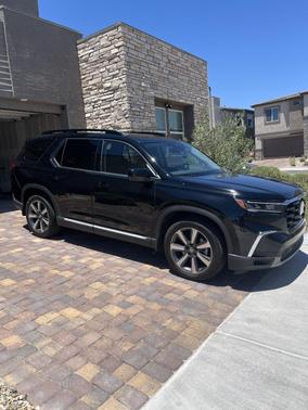 Black 2025 Honda Pilot Touring AWD