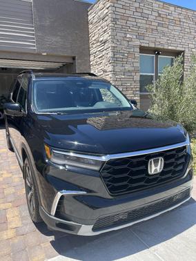 Black 2025 Honda Pilot Touring AWD