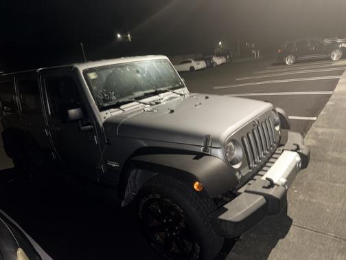 Gray 2015 Jeep Wrangler Unlimited Sahara