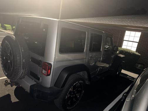 Gray 2015 Jeep Wrangler Unlimited Sahara