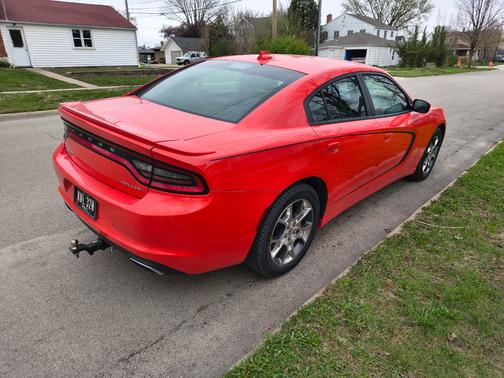 Orange 2016 Dodge Charger SXT