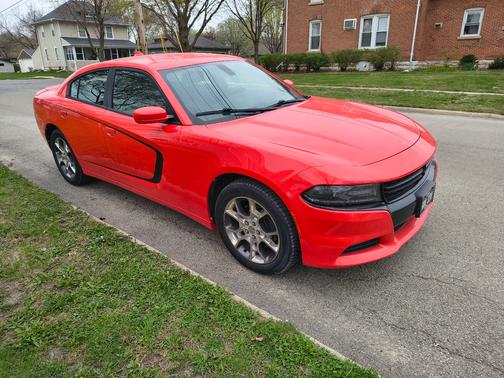 Orange 2016 Dodge Charger SXT