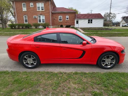 Orange 2016 Dodge Charger SXT