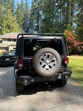 Black 2014 Jeep Wrangler Unlimited Sport