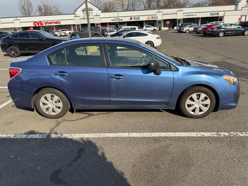 Blue 2014 Subaru Impreza 2.0i