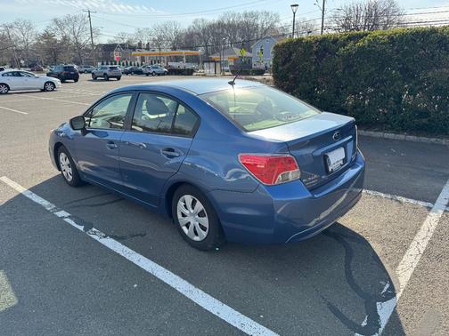 Blue 2014 Subaru Impreza 2.0i