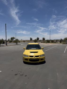 Yellow 2003 Mitsubishi Lancer Evolution Base