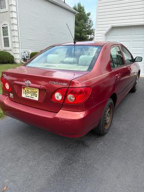 Red 2005 Toyota Corolla CE