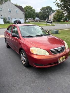 Red 2005 Toyota Corolla CE