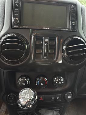 Gray 2016 Jeep Wrangler Unlimited Sahara
