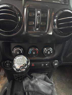 Gray 2016 Jeep Wrangler Unlimited Sahara
