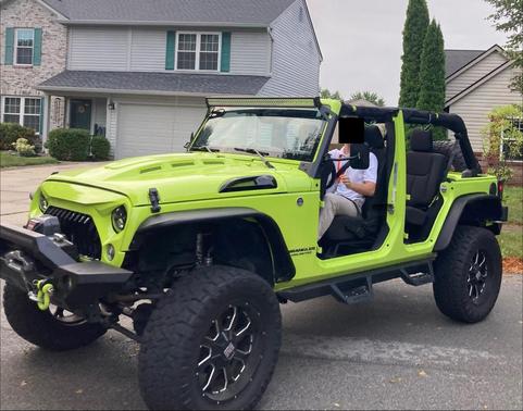 Green 2017 Jeep Wrangler Unlimited Sport