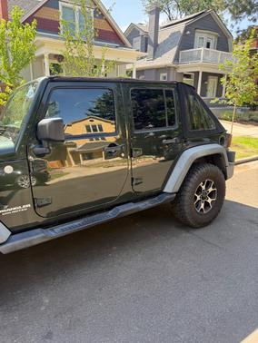 Green 2011 Jeep Wrangler Unlimited Rubicon