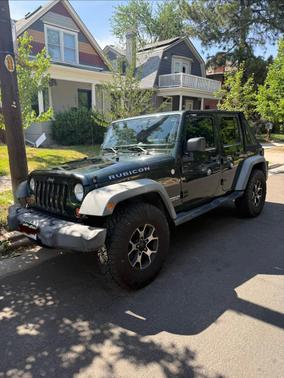 Green 2011 Jeep Wrangler Unlimited Rubicon