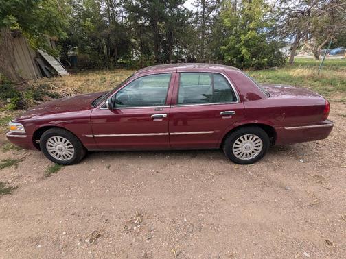 Red 2008 Mercury Grand Marquis LS
