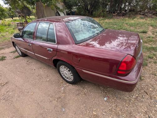 Red 2008 Mercury Grand Marquis LS