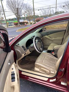 Red 2010 Nissan Altima 2.5 S