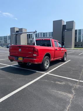 Red 2012 RAM 1500 Sport