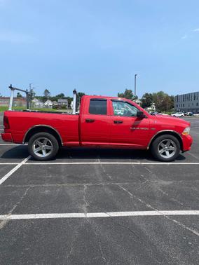 Red 2012 RAM 1500 Sport