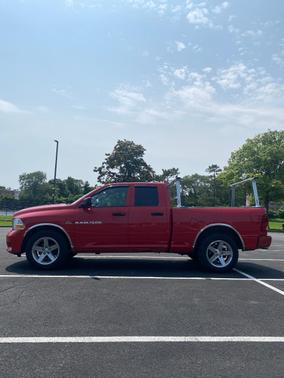 Red 2012 RAM 1500 Sport