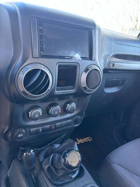 Black 2015 Jeep Wrangler Unlimited Sport