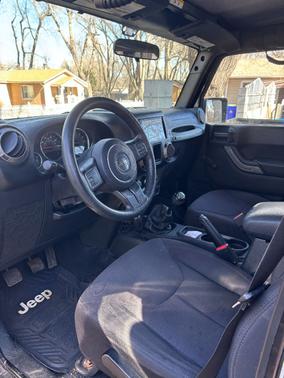 Black 2015 Jeep Wrangler Unlimited Sport