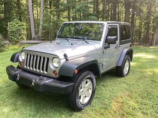 Silver 2013 Jeep Wrangler Sport