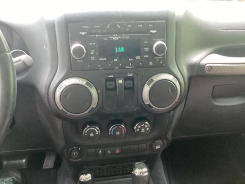 Silver 2013 Jeep Wrangler Sport
