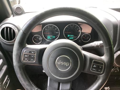 Silver 2013 Jeep Wrangler Sport