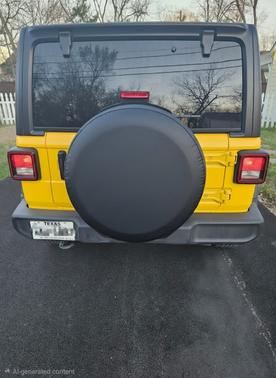 Yellow 2021 Jeep Wrangler Sport S