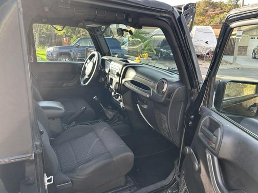 Black 2011 Jeep Wrangler Sport