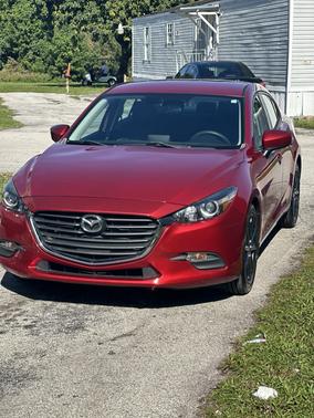 Red 2016 Mazda Mazda3 i Sport
