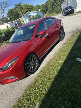 Red 2016 Mazda Mazda3 i Sport