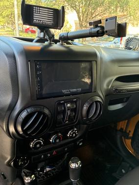 Yellow 2014 Jeep Wrangler Unlimited Rubicon