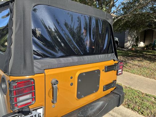 Yellow 2014 Jeep Wrangler Unlimited Rubicon