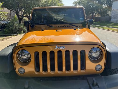 Yellow 2014 Jeep Wrangler Unlimited Rubicon